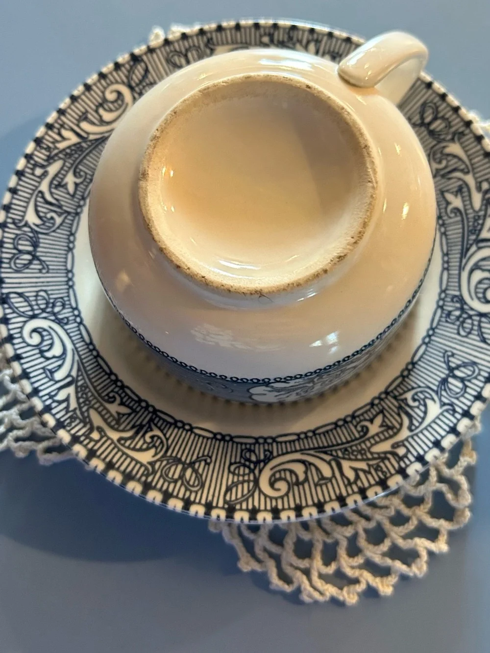 Blue and White Porcelain Teacup with Matching Saucer